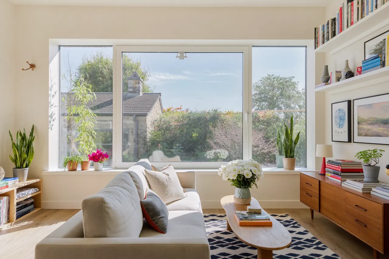 Living room with a new double glazed window and blinds