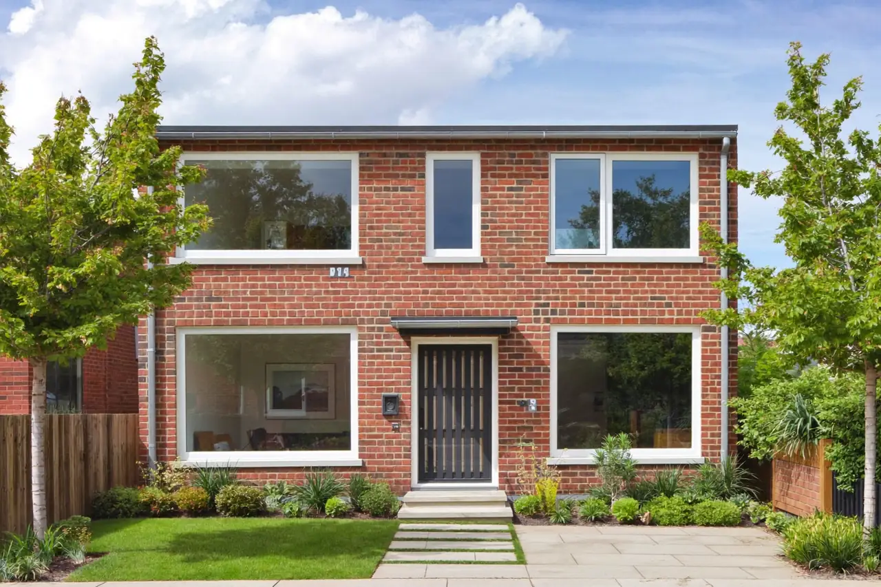 Front elevation of a house fitted with a full set of new double glazed windows